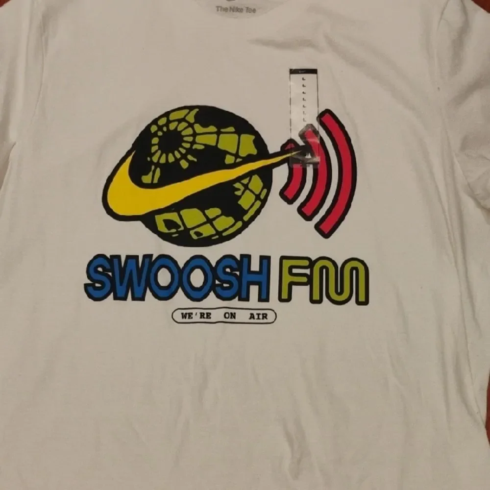 Nike White Tee with Gray Logo